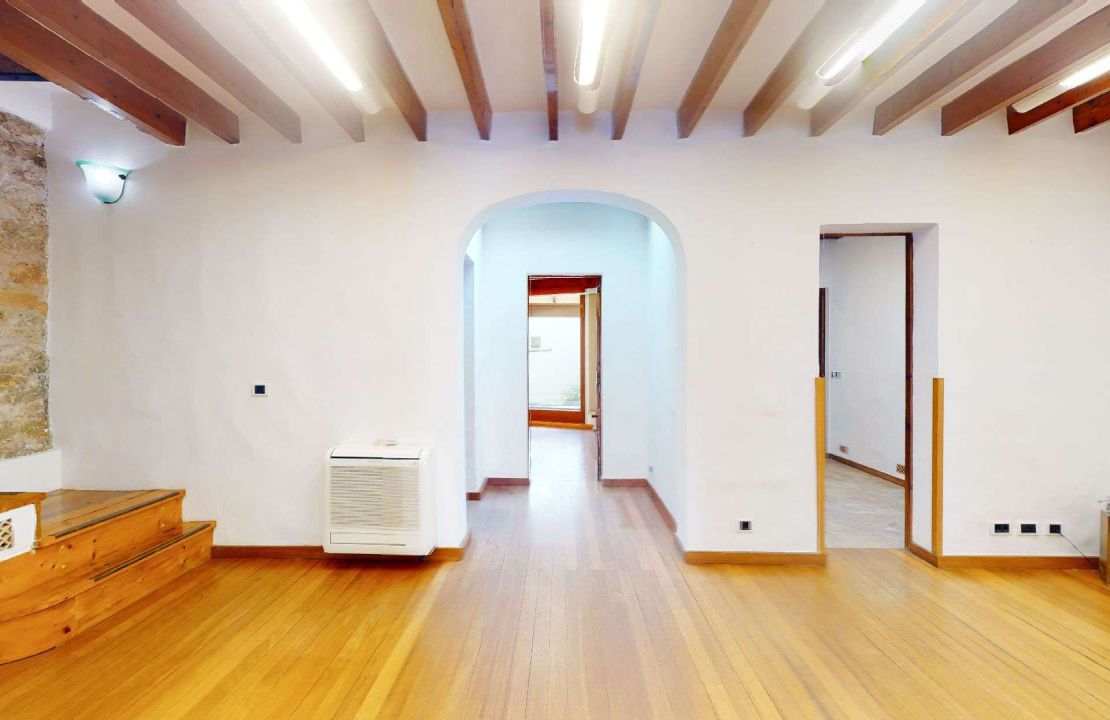 Townhouse in Puerto Pollensa with covered private parking space for sale.