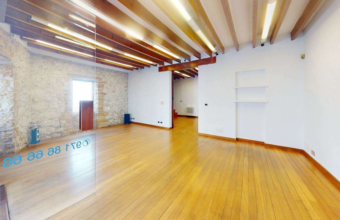 Townhouse in Puerto Pollensa with covered private parking space for sale.