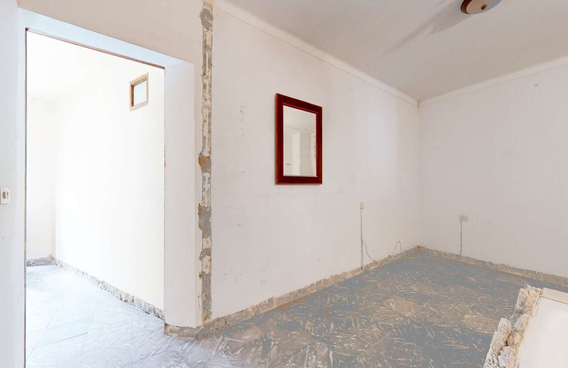 Townhouse in Pollenca Mallorca with large patio and renovation project