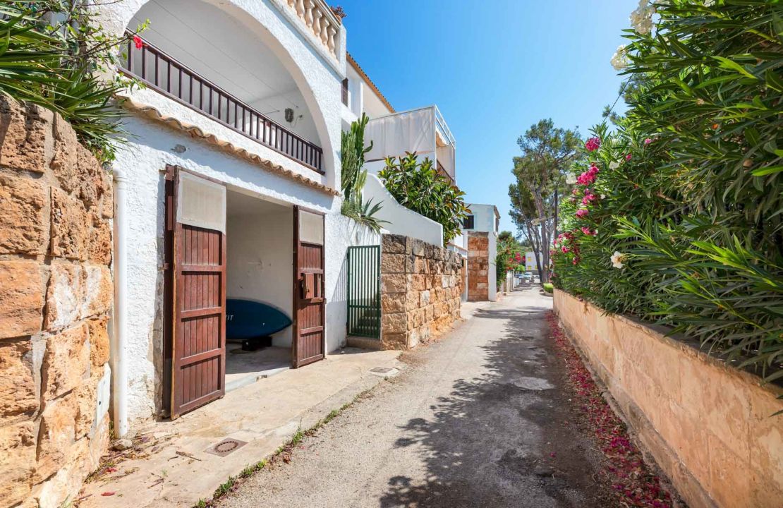 Second line Mediterranean beach house in Alcudia, Alcanada with stunning sea views and rental license