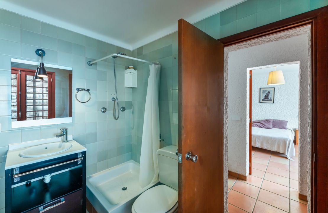 Second line Mediterranean beach house in Alcudia, Alcanada with stunning sea views and rental license