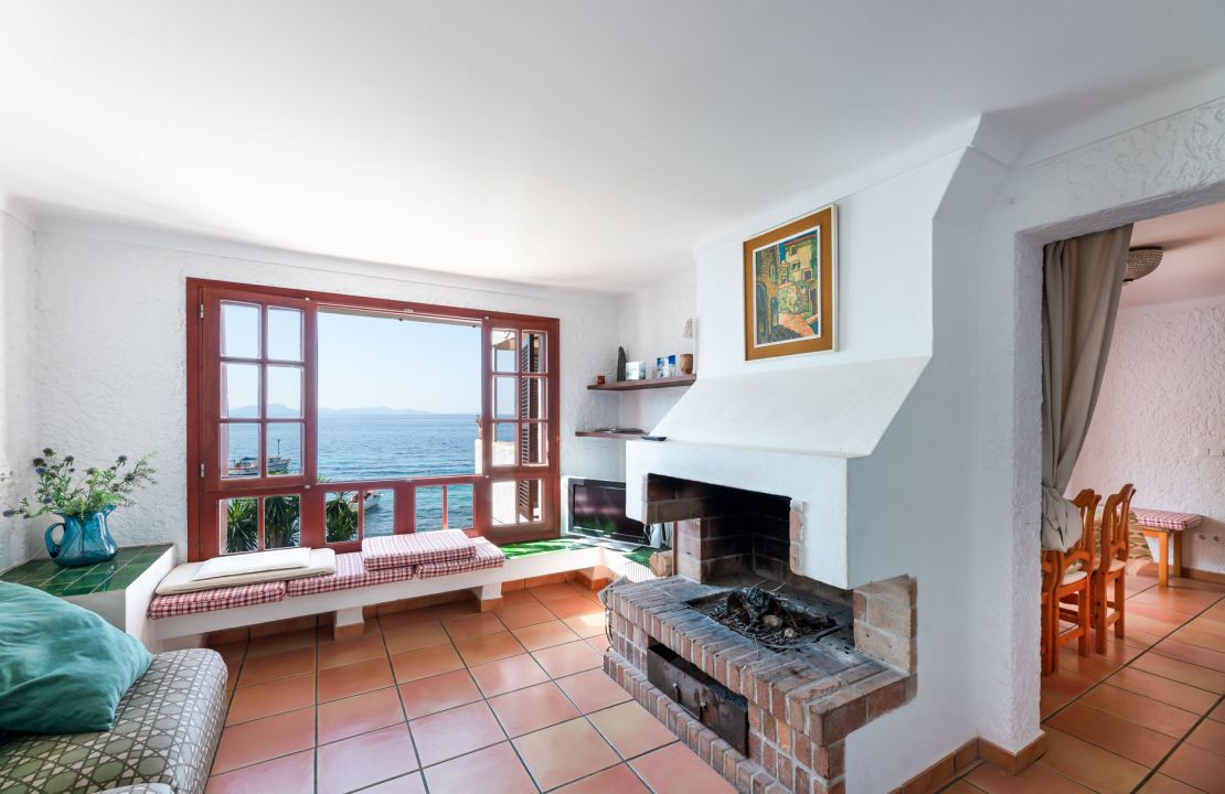 Second line Mediterranean beach house in Alcudia, Alcanada with stunning sea views and rental license