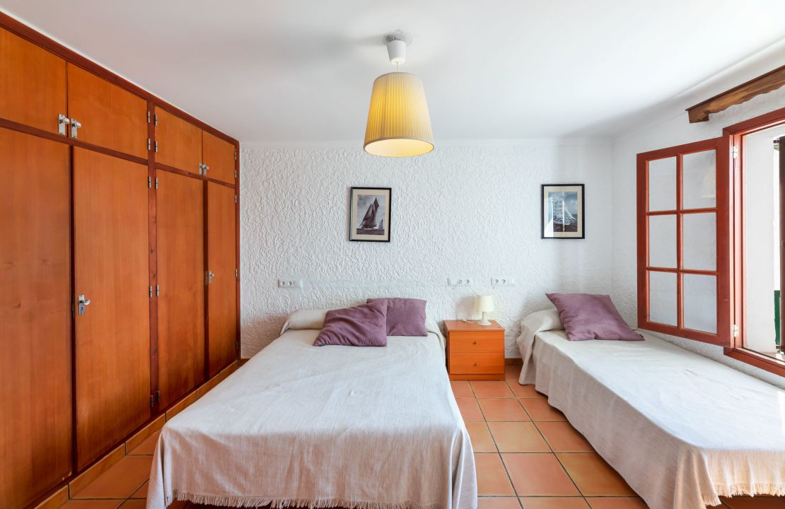Second line Mediterranean beach house in Alcudia, Alcanada with stunning sea views and rental license