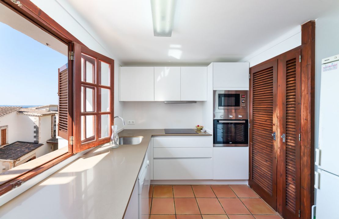 Second line Mediterranean beach house in Alcudia, Alcanada with stunning sea views and rental license
