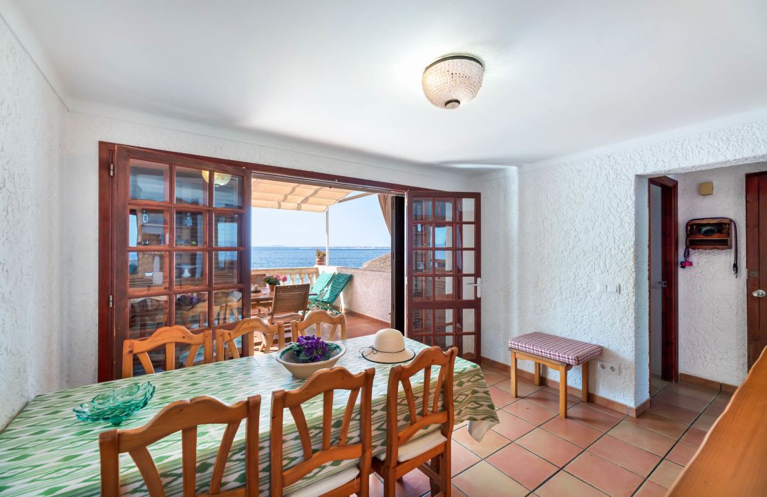 Second line Mediterranean beach house in Alcudia, Alcanada with stunning sea views and rental license