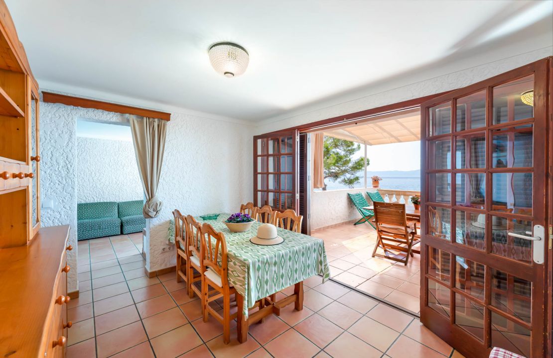 Second line Mediterranean beach house in Alcudia, Alcanada with stunning sea views and rental license