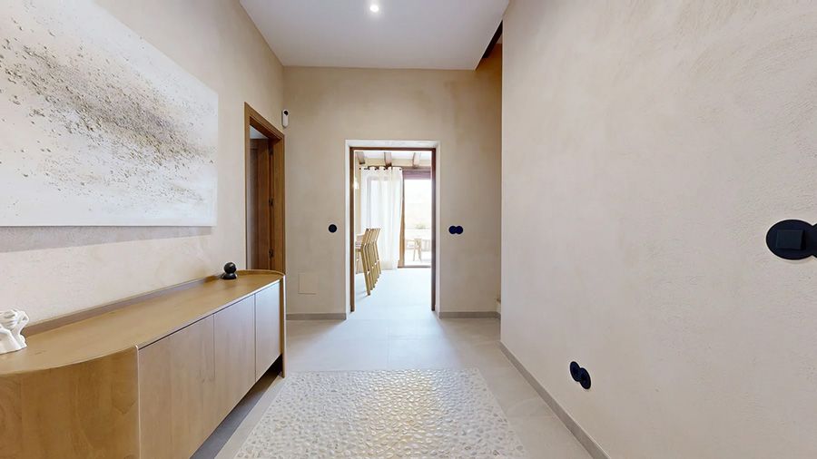 Casa adosada con patio y piscina en Muro